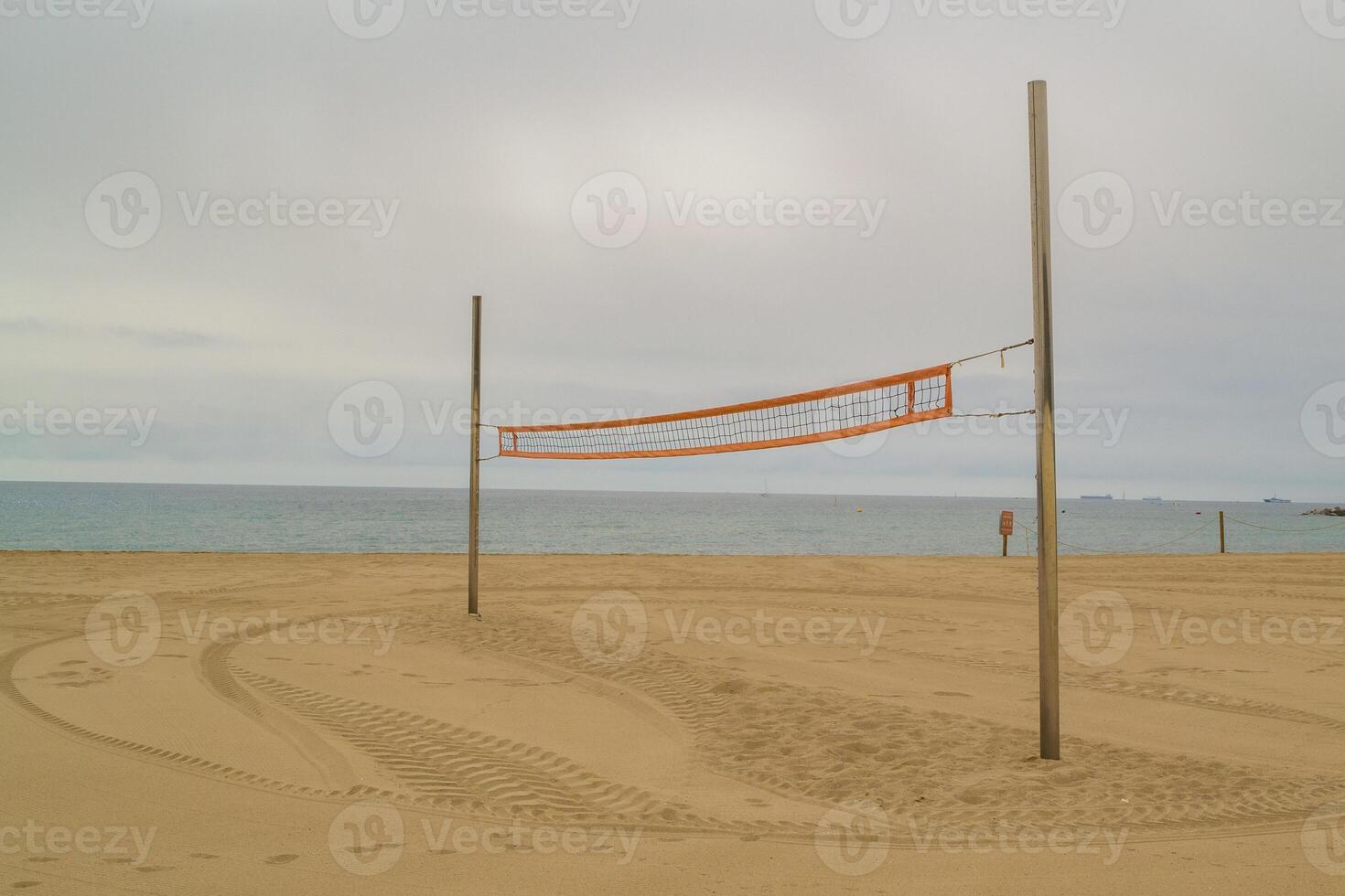 A volleyball net on a beach photo