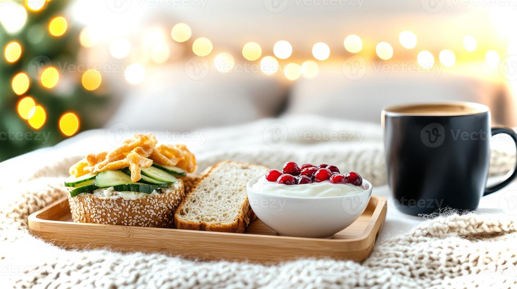 Soft knit blanket covers a cozy setting where a wooden tray holds a sandwich, yogurt, and coffee, creating a perfect brunch scene in a tranquil bedroom. photo