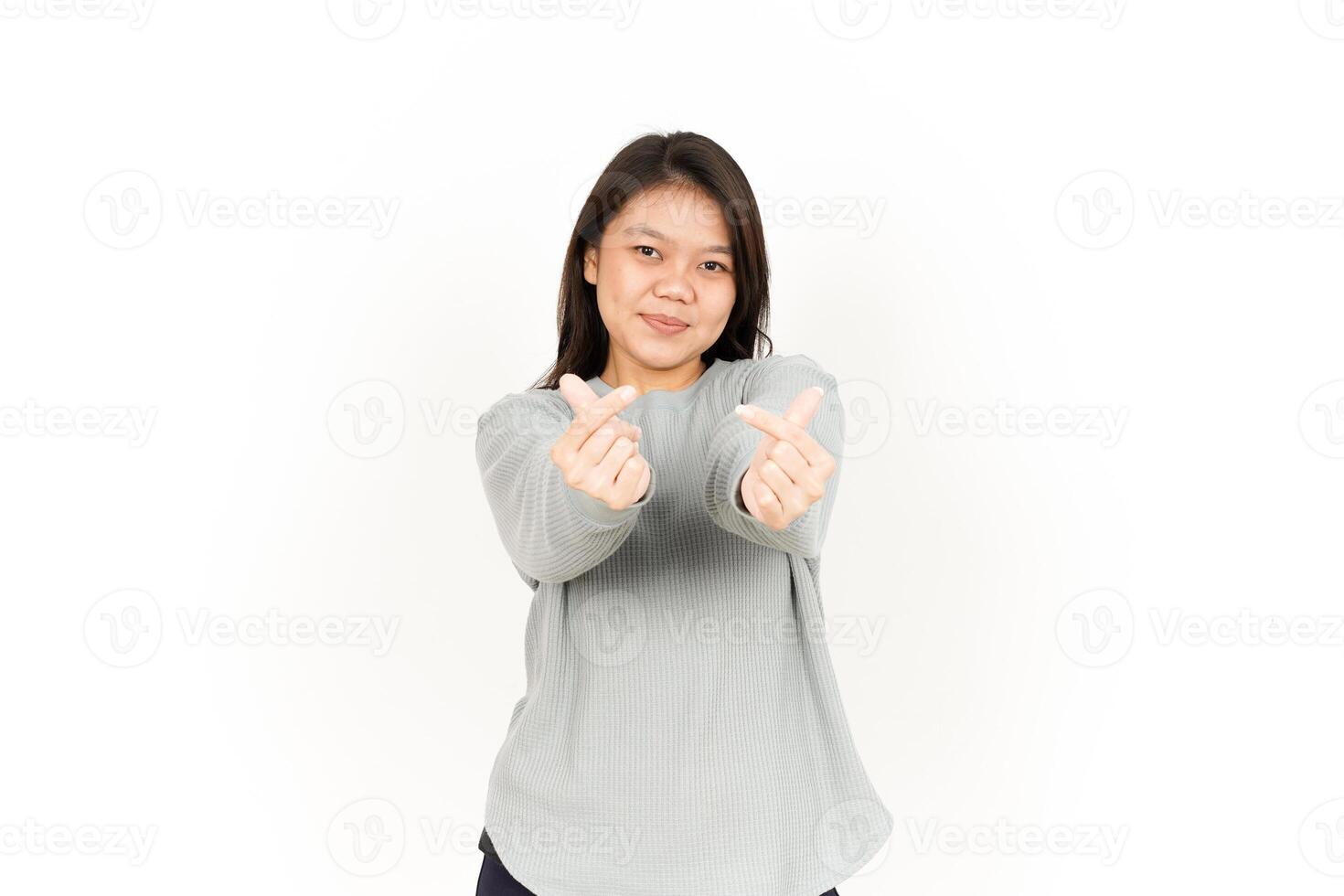 A woman is making a thumbs up gesture photo