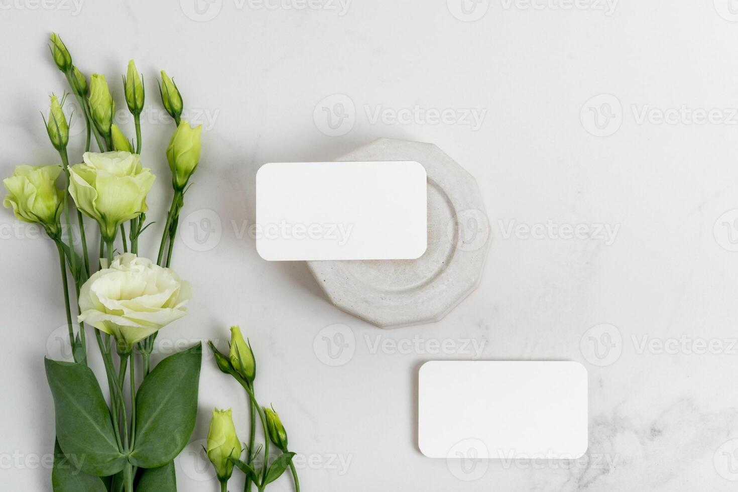 Mockup blank business cards for your design, template on gray marble background with concrete elements photo