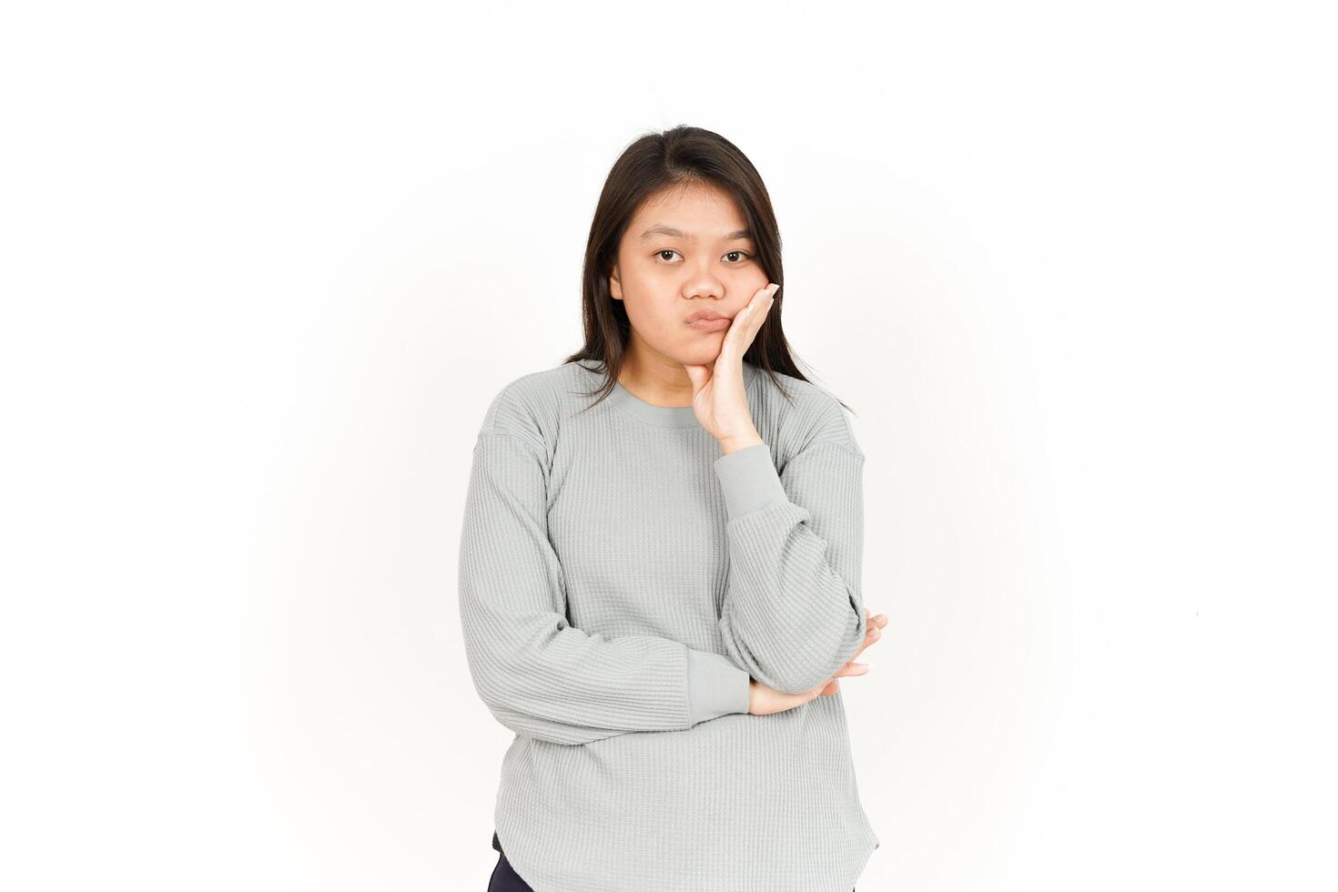 A woman in a grey sweatshirt and black pants photo