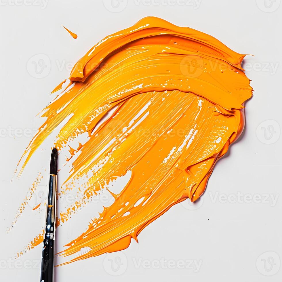 Vibrant Abstract Orange Paint Brush Stroke Close-Up photo