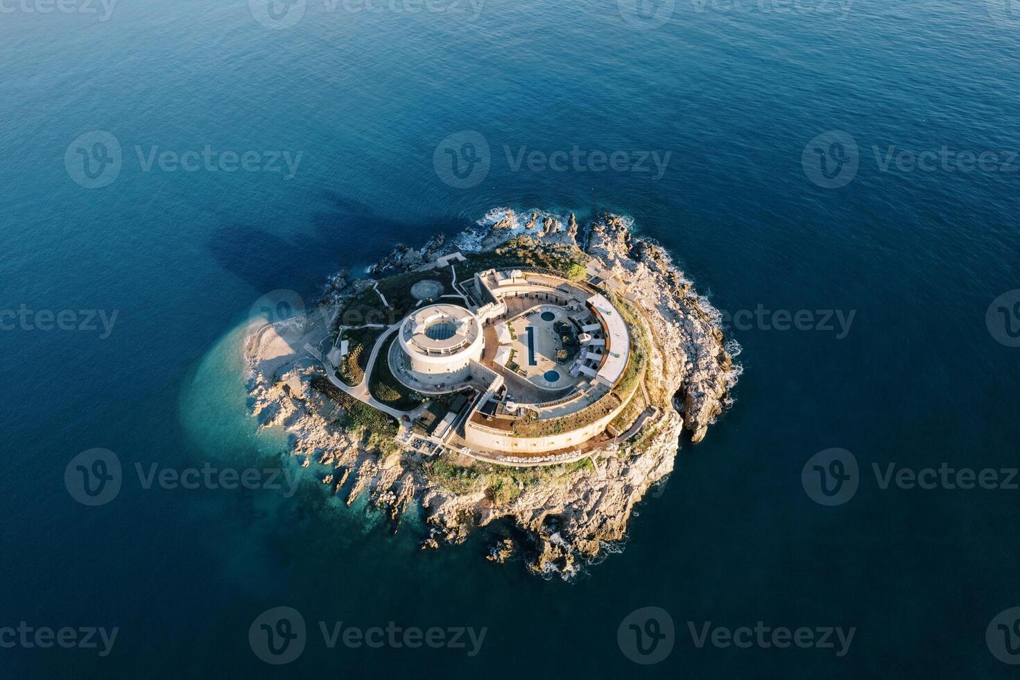 Reconstructed hotel from a fort on the island of Mamula in the Bay of Kotor. Montenegro. Top view photo