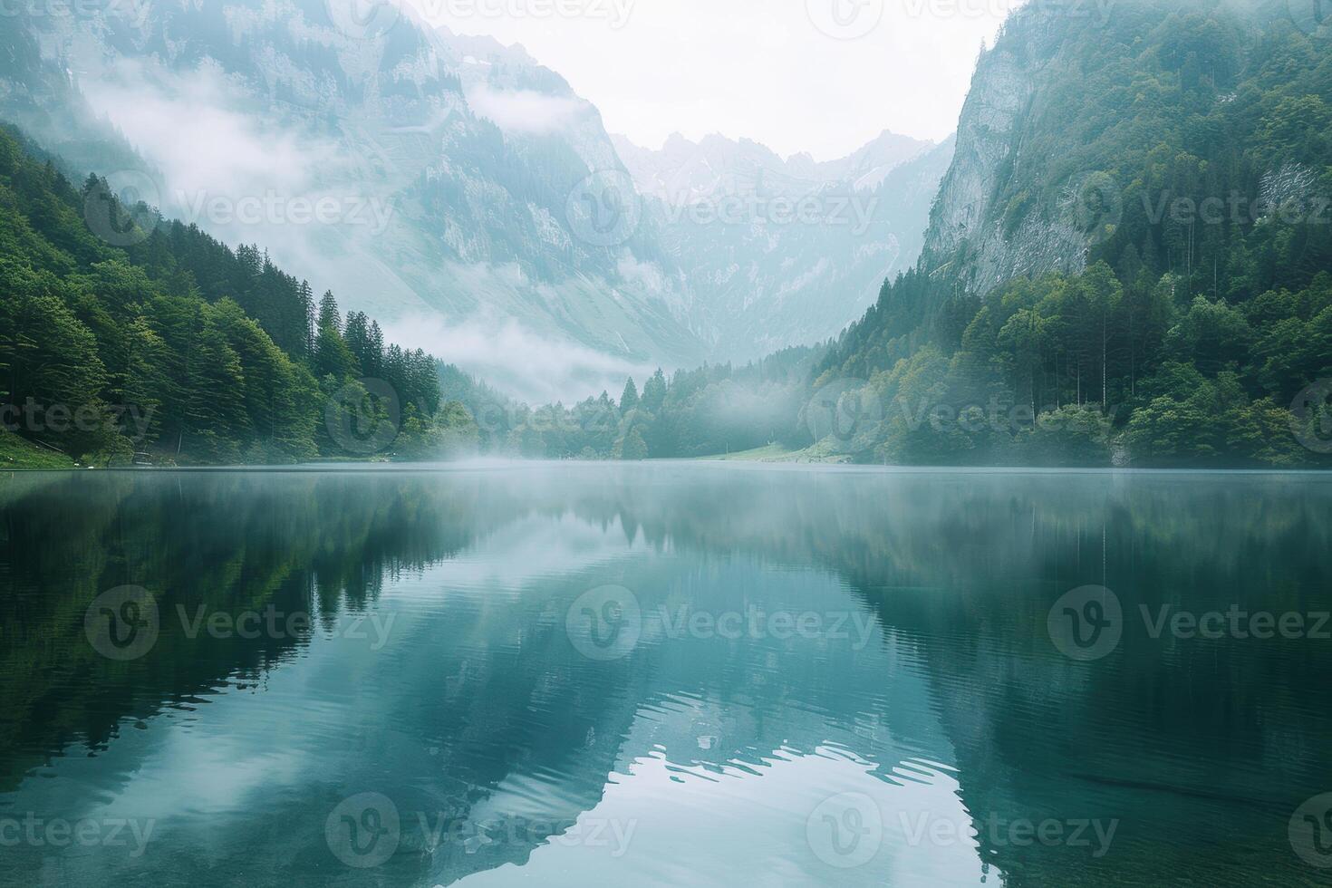 Tranquil Mountain Lake with Misty Reflections Peaceful Landscape for Serenity and Calmness photo