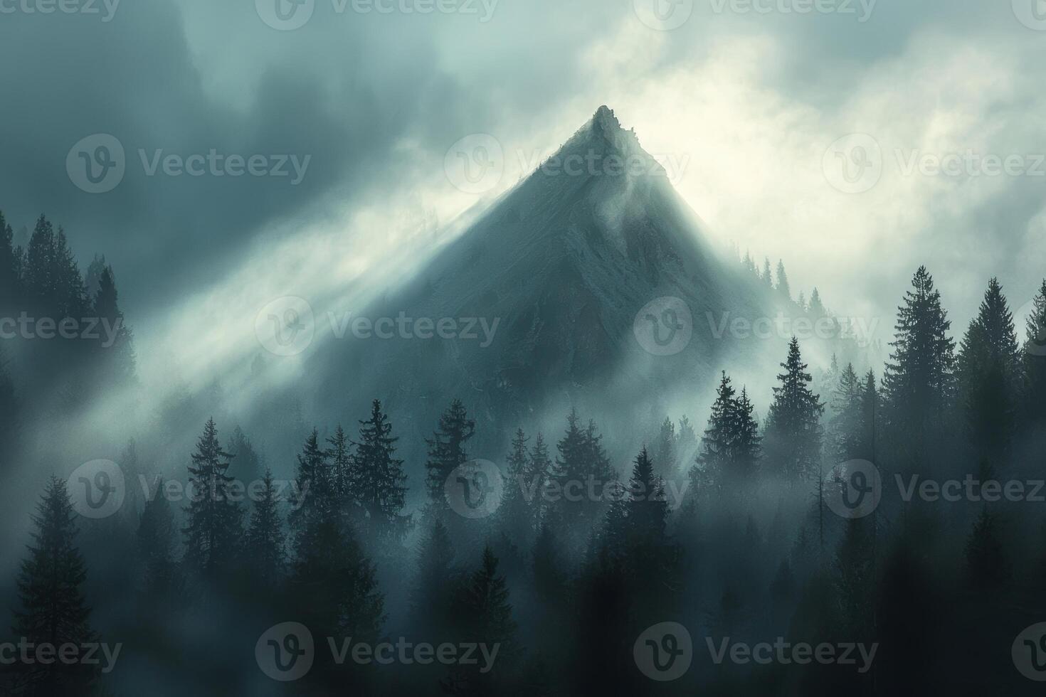 Mystical Volcanic Mountain at Sunrise with Sunlight Breaking Through Fog in Lush Forest photo