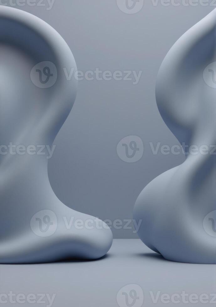 Two large white shapes sitting on a gray surface photo