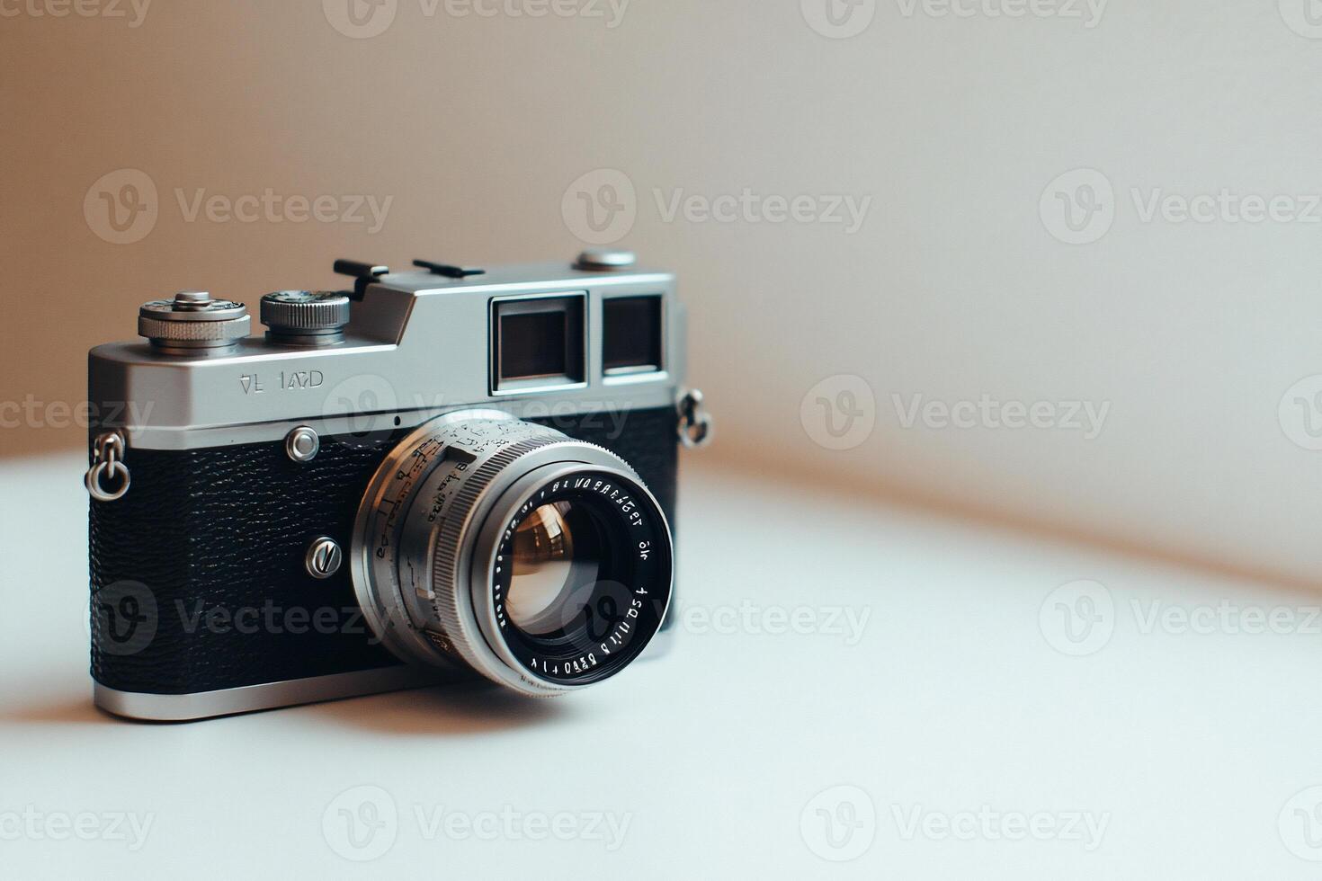 Vintage silver camera on white background. photo
