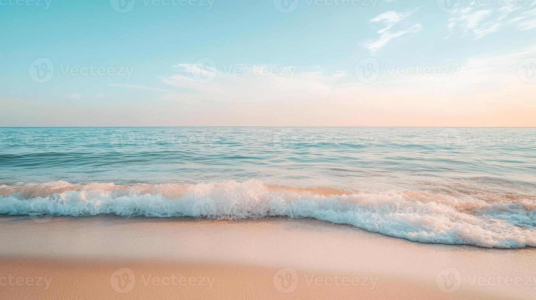 A serene beach scene with gentle waves and a calm sky at sunset photo