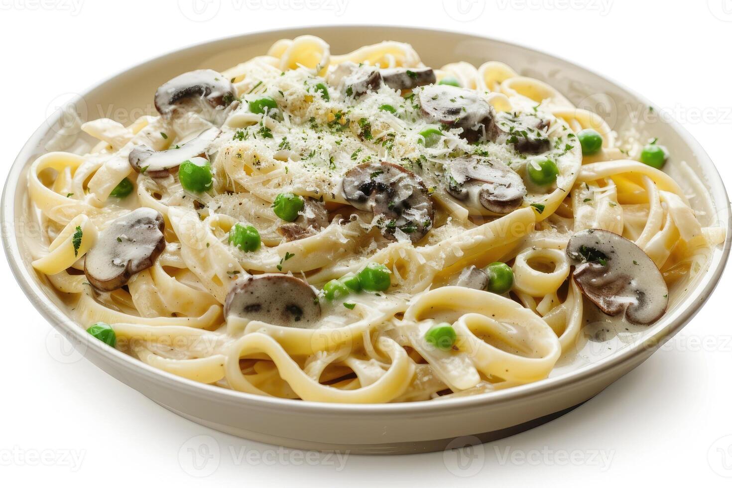 A plate of creamy fettuccine pasta with mushrooms and peas, garnished with cheese photo