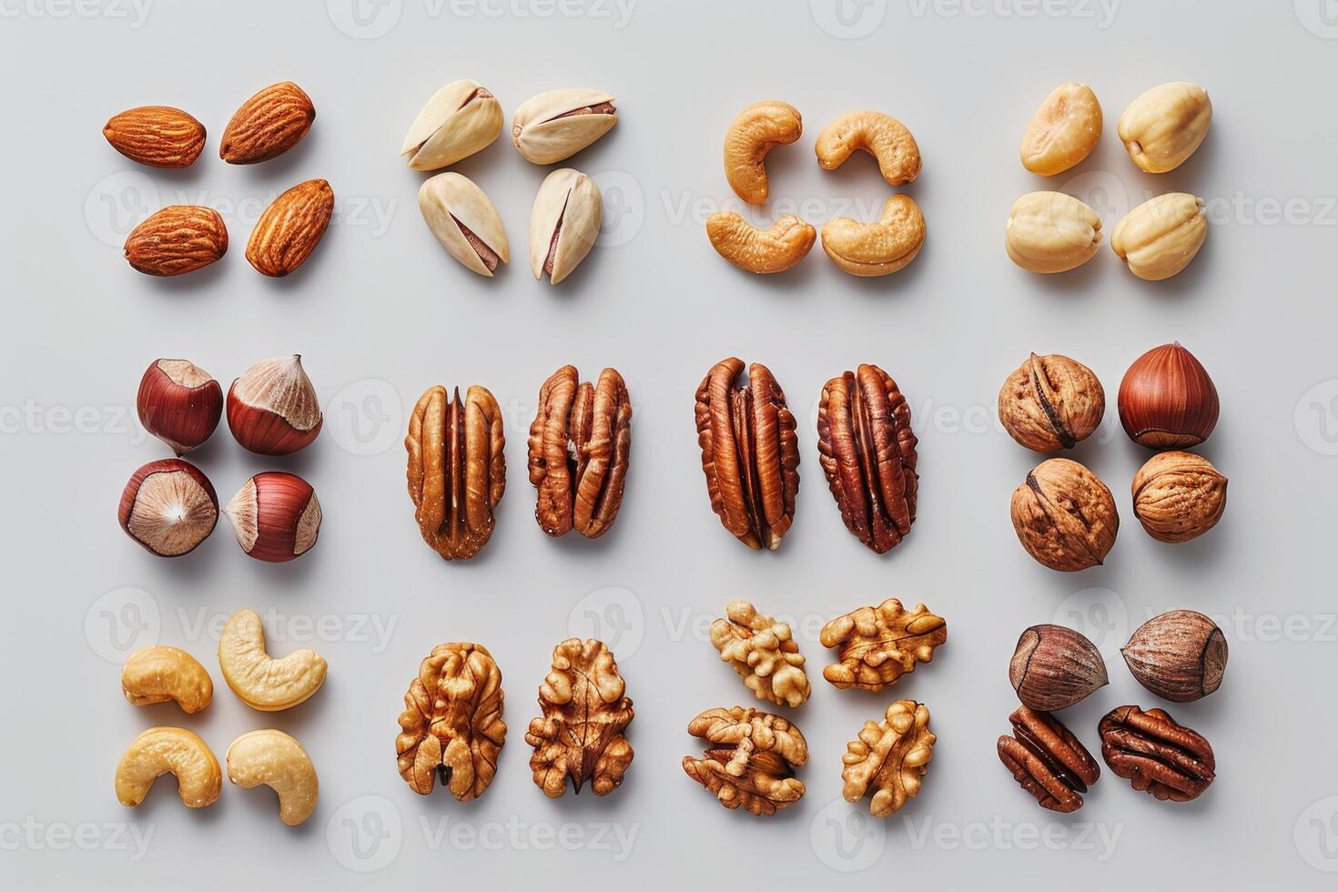 A variety of nuts arranged in an organized layout on a light background photo