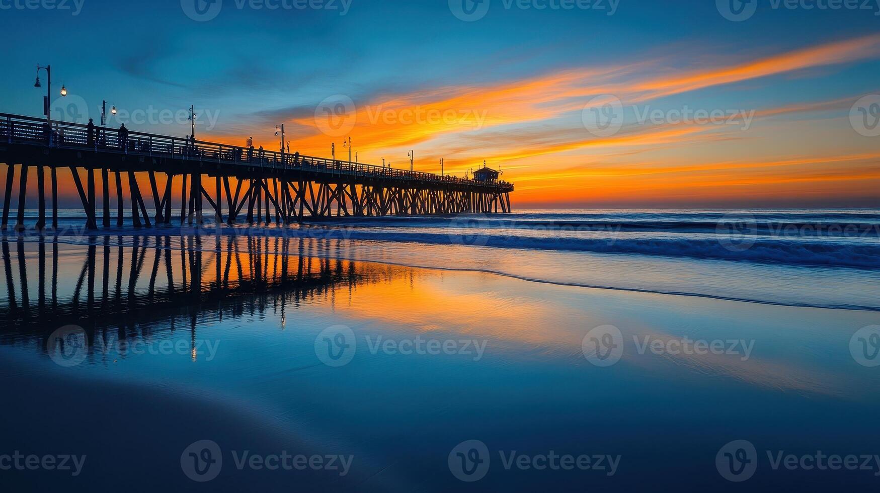 A serene sunset over a pier reflecting on calm waters, creating a tranquil coastal scene photo