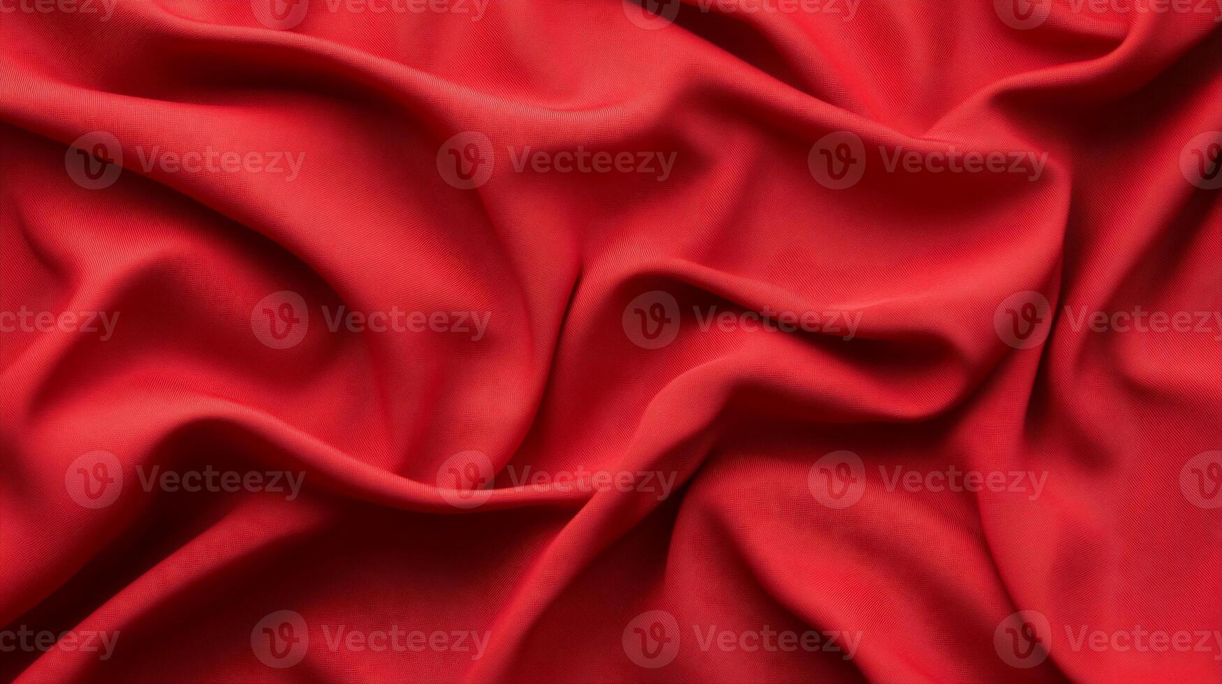 A red silk fabric with folds photo