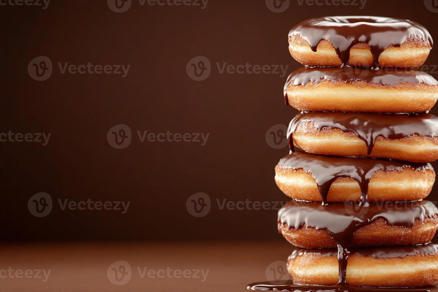 A stack of donuts with chocolate glaze photo