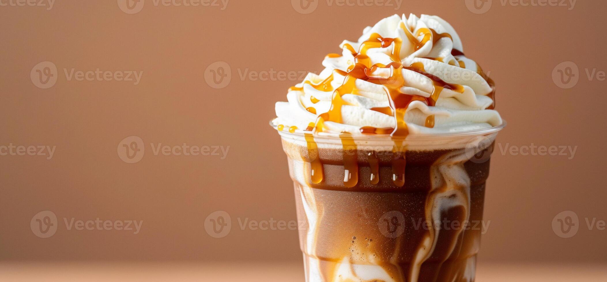 A drink with whipped cream and caramel sauce photo