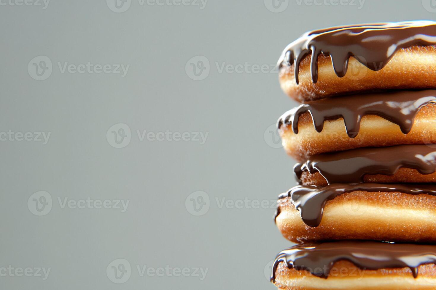 A stack of donuts with chocolate glaze photo