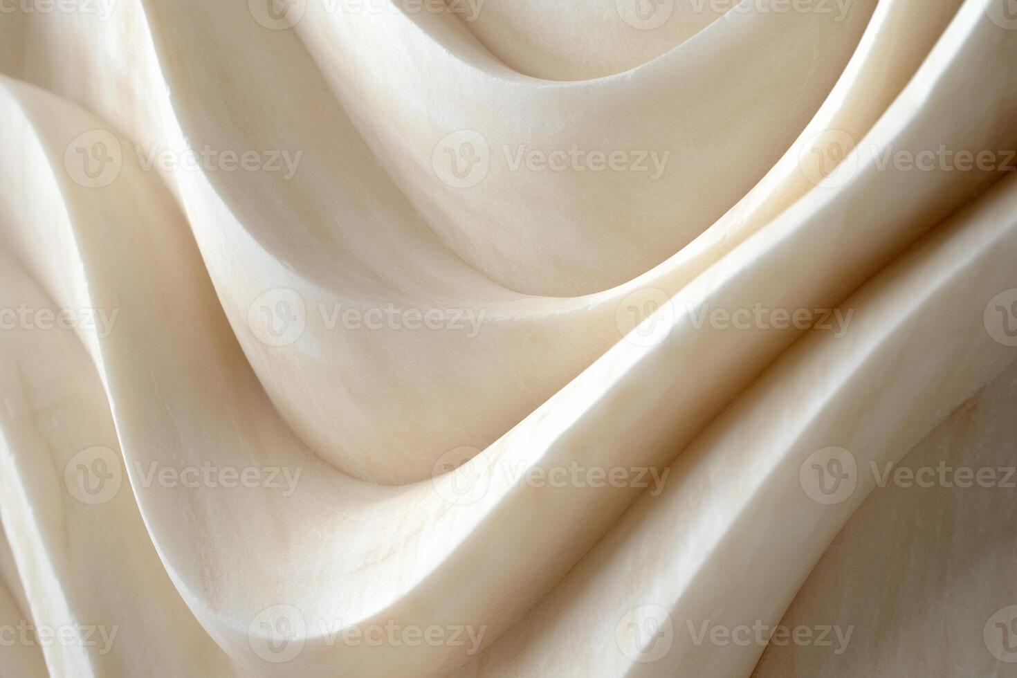 Creamy, flowing curves of sculpted material photo