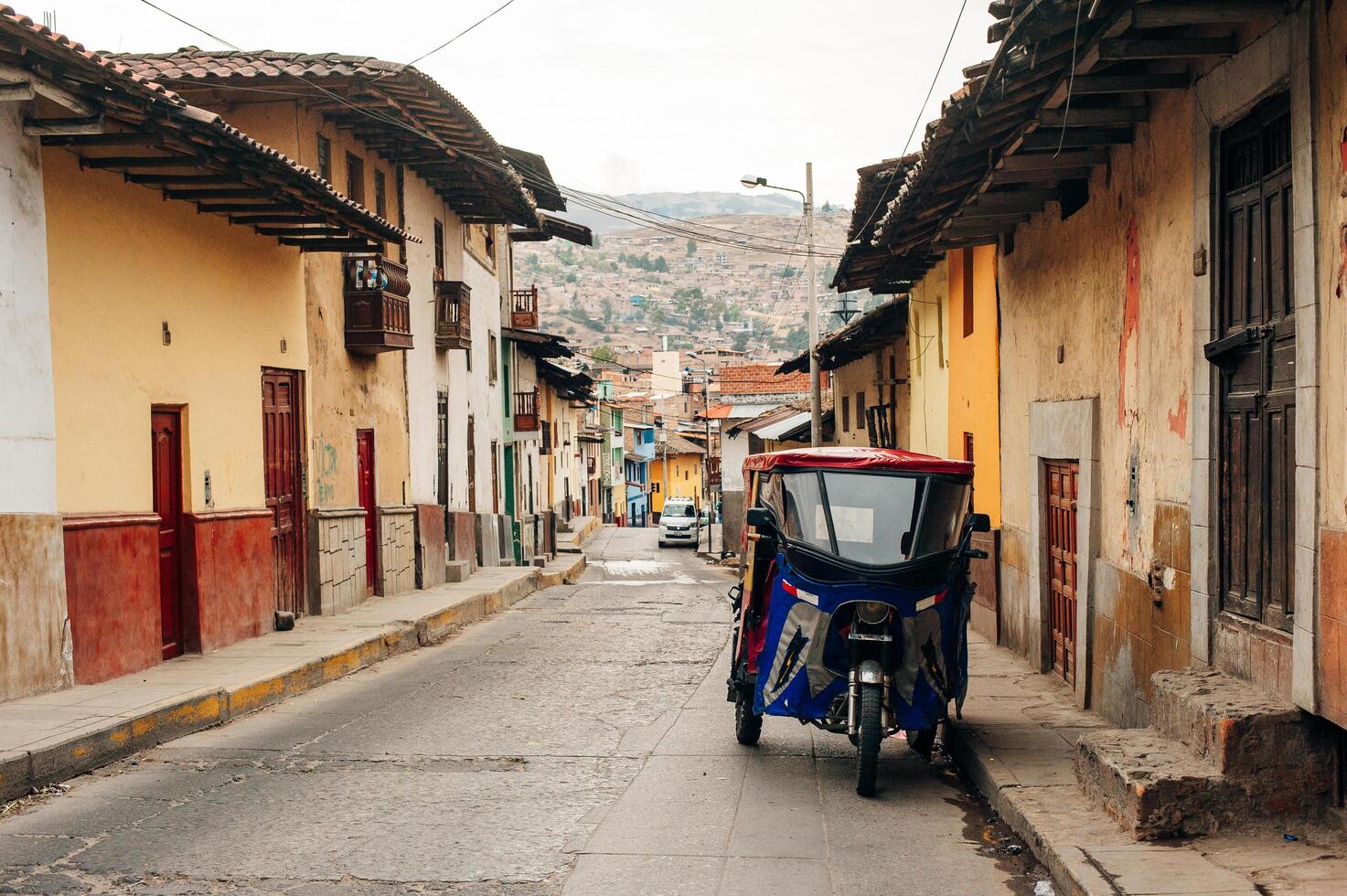 kahamarca, peru - november, 2019 tuk tuk on street in latin america photo