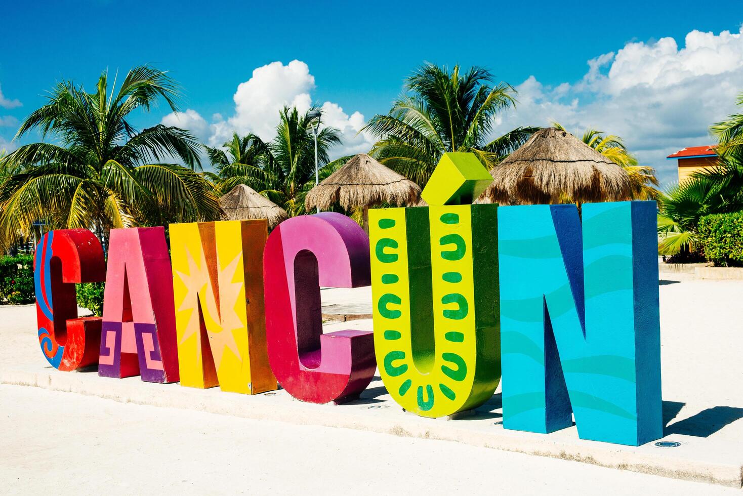 Cancun, Quintana Roo, Mexico - december, 2019 Cancun colorful sign by blue ocean in the Caribbean. Touristic spot photo