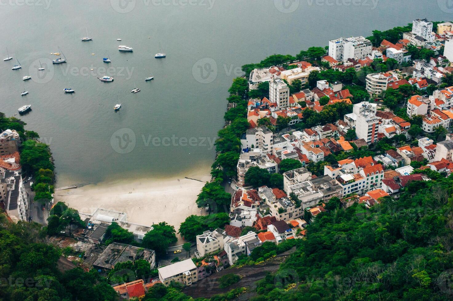 Beautiful landscape with ocean, city buildings and rainforest mountains, Rio de Janeiro, Brazil. photo