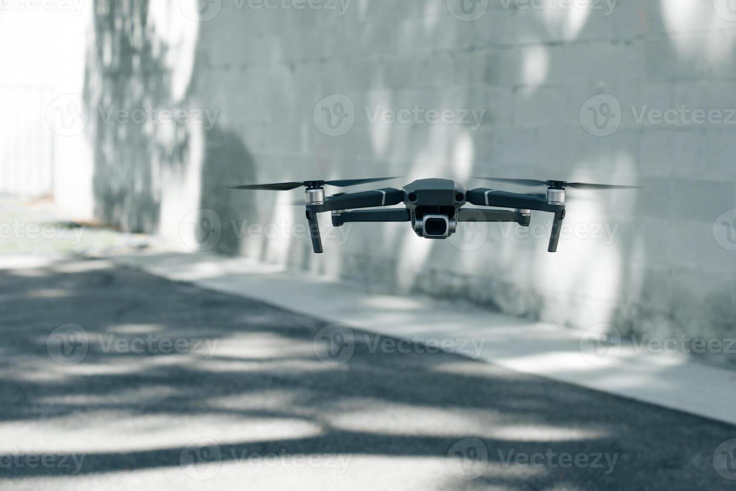 drone copter flying with digital camera in outdoor. photo