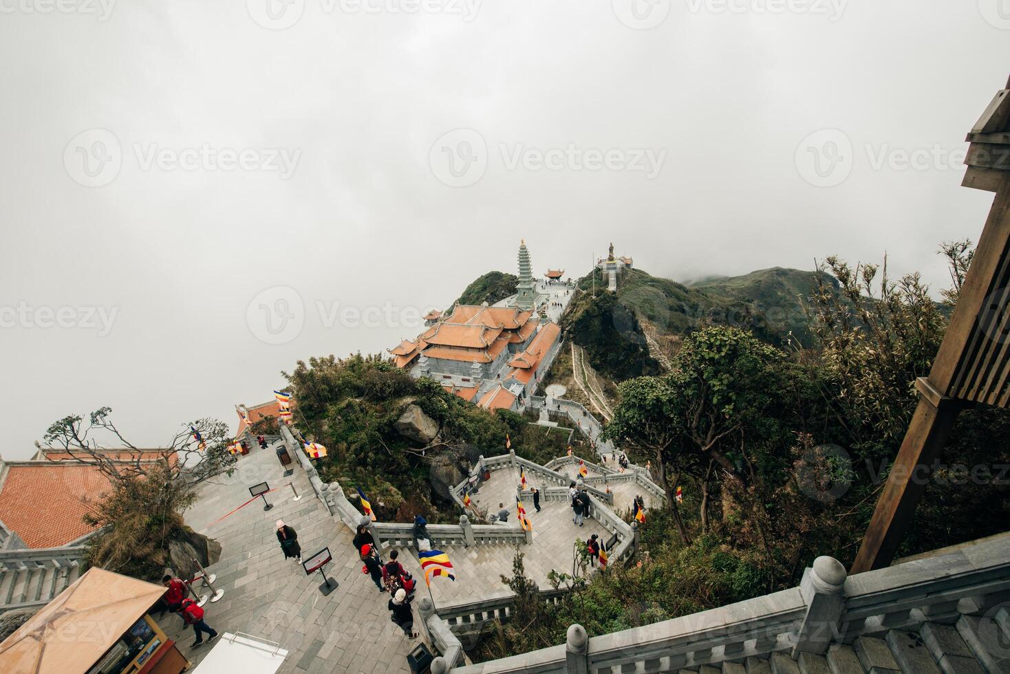 Looking at Fansipan mountain peak at an altitude of 3143m in Sa Pa town, Lao Cai province, Vietnam - may 2 2024. photo