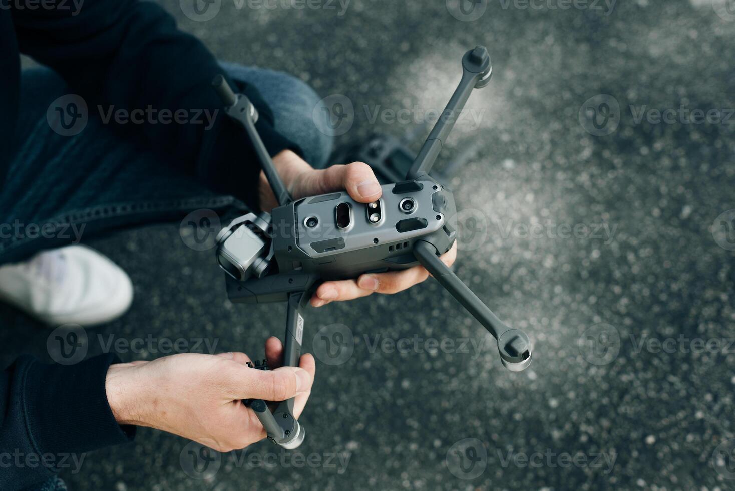 Service man repairing small drone. photo