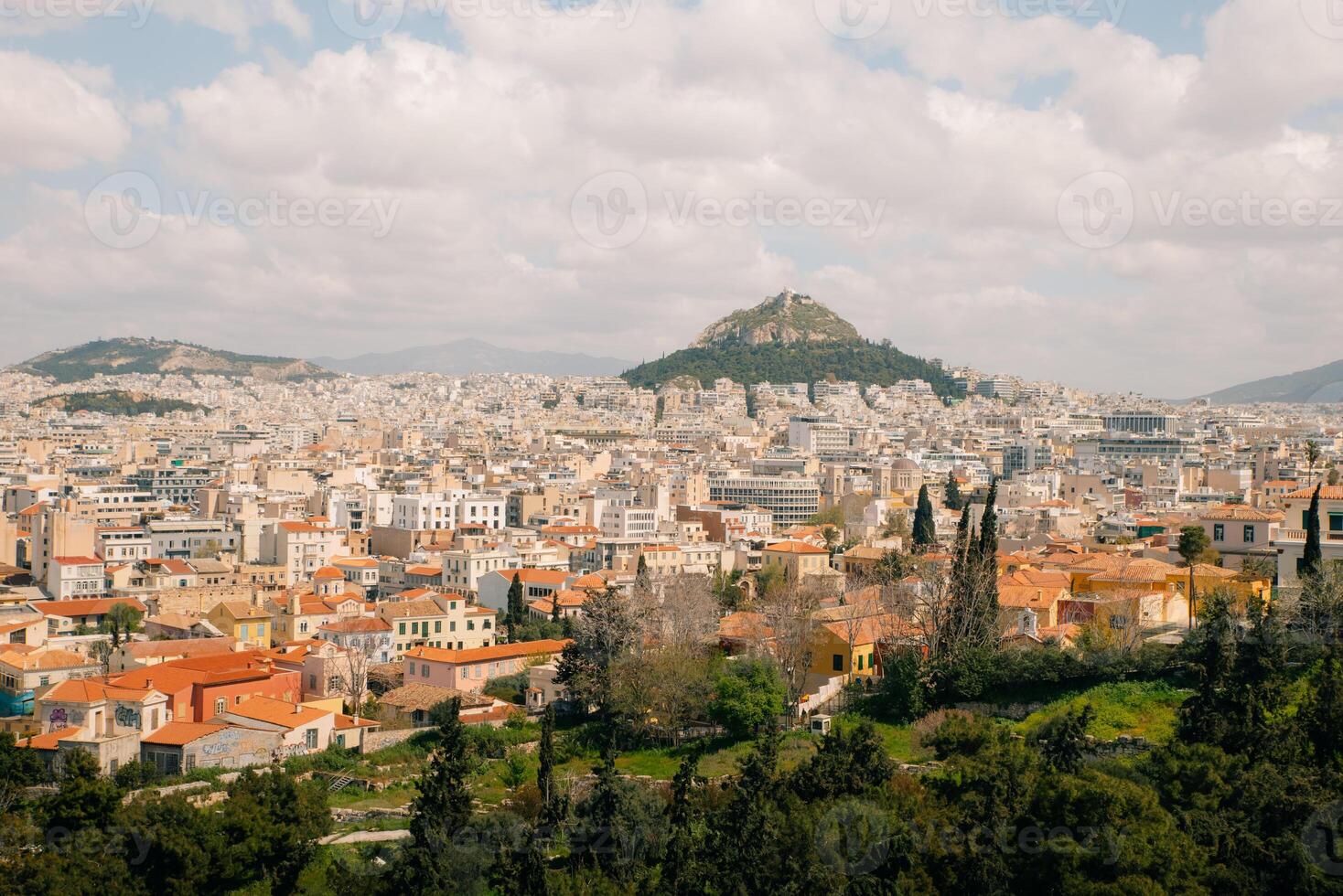 A view of Lycabettus Hill and the Ancient Marketplace of Athens, Greece. photo