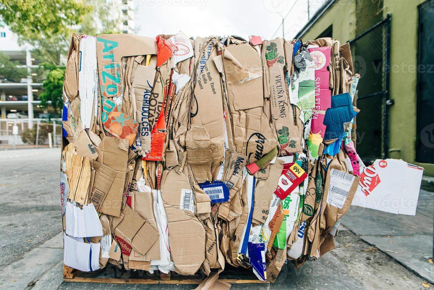 usa, miami - april, 2020 Stack of pressed corrugated cardboards ready for recycling. photo