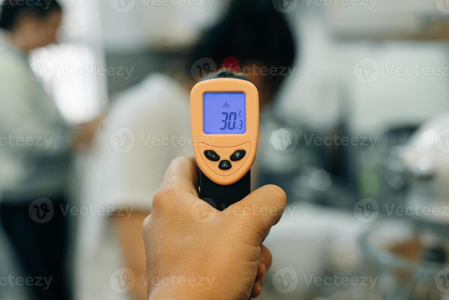 Digital medical infrared forehead thermometer gun non-contact of measuring temperature, for coronavirus testing. photo