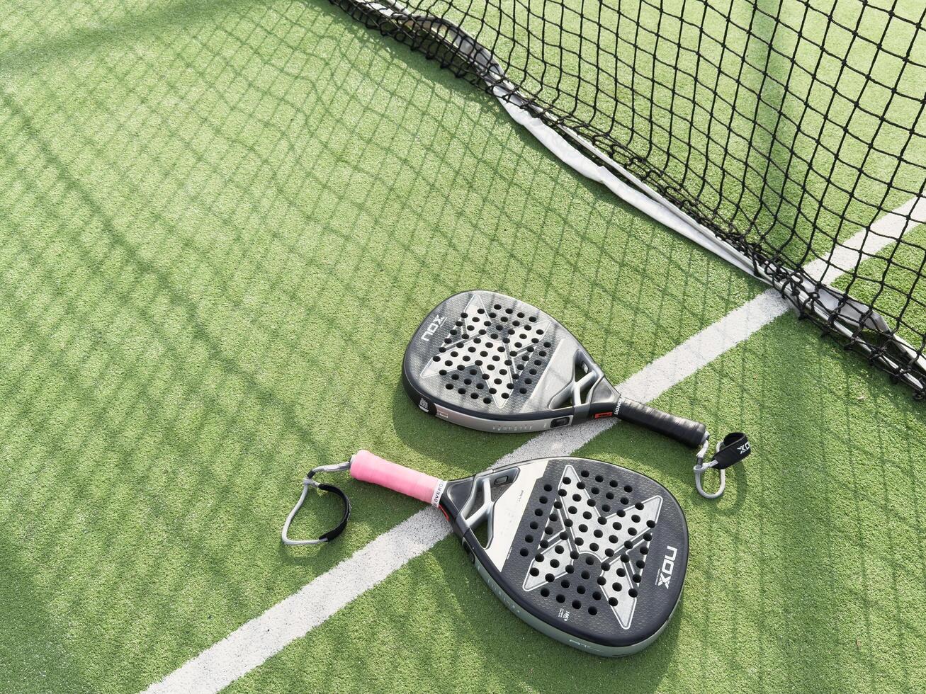 Kyiv, Ukraine, October 23, 2024 padel racket nox on a padel court with a ball photo