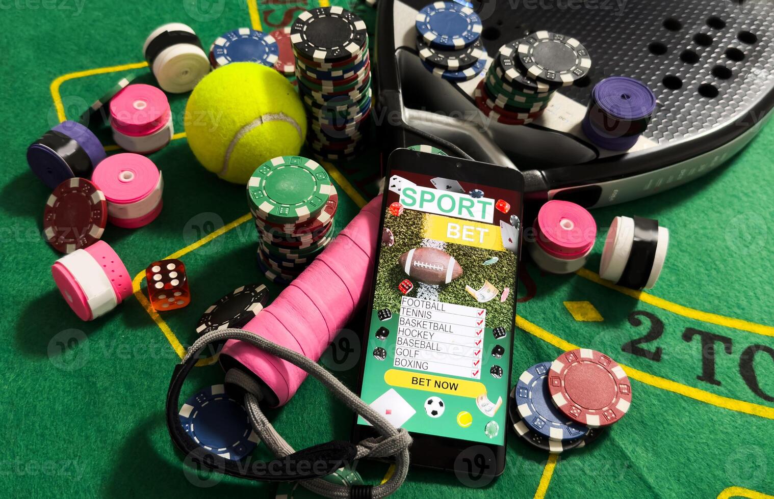 Conceptual background of online sports betting with objects representing different sports, money and chips to bet. Front view. photo