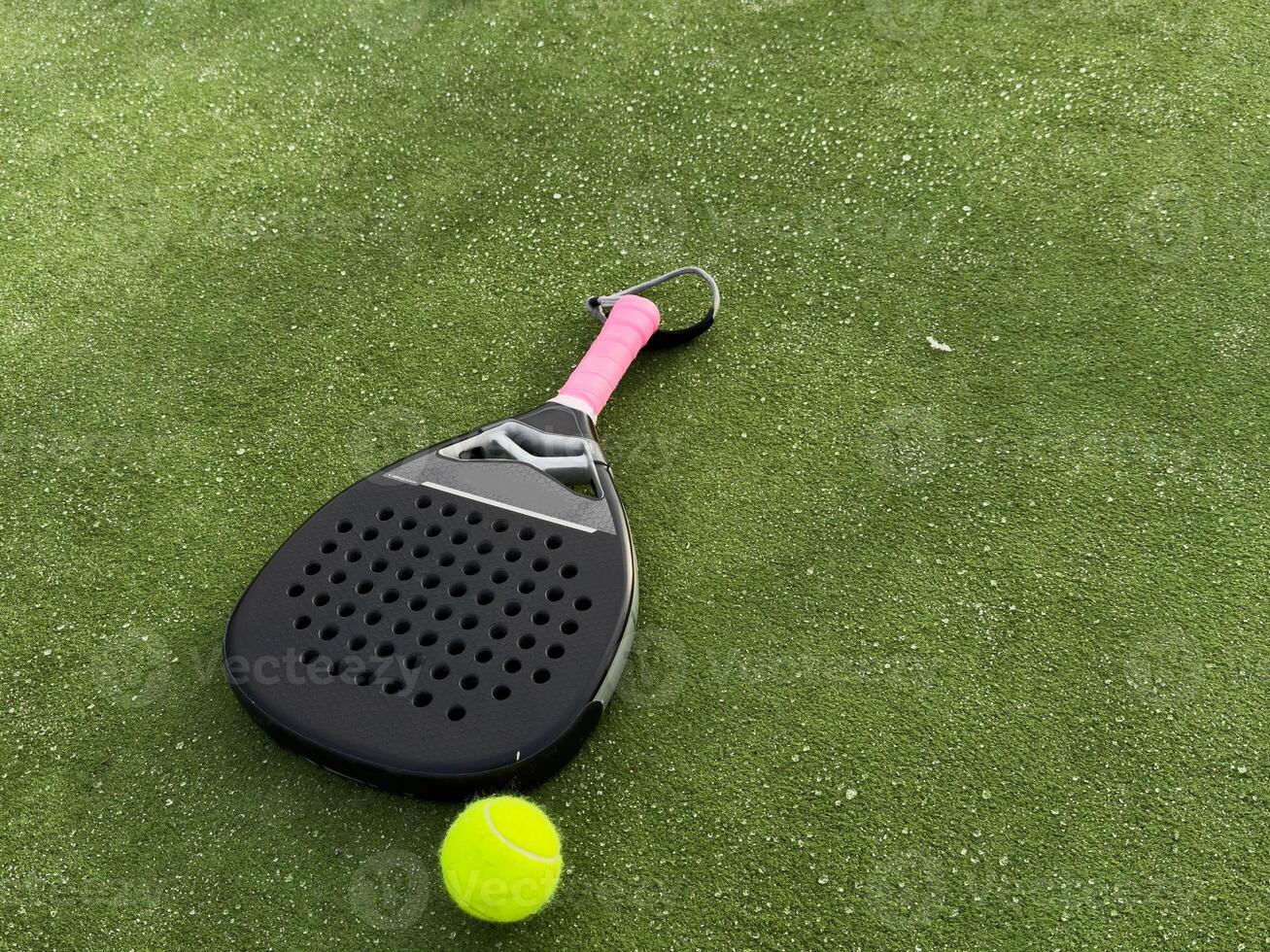 Padel tennis racket sport court and balls. Download a high quality photo with paddle for the design of a sports app or soical media advertisement