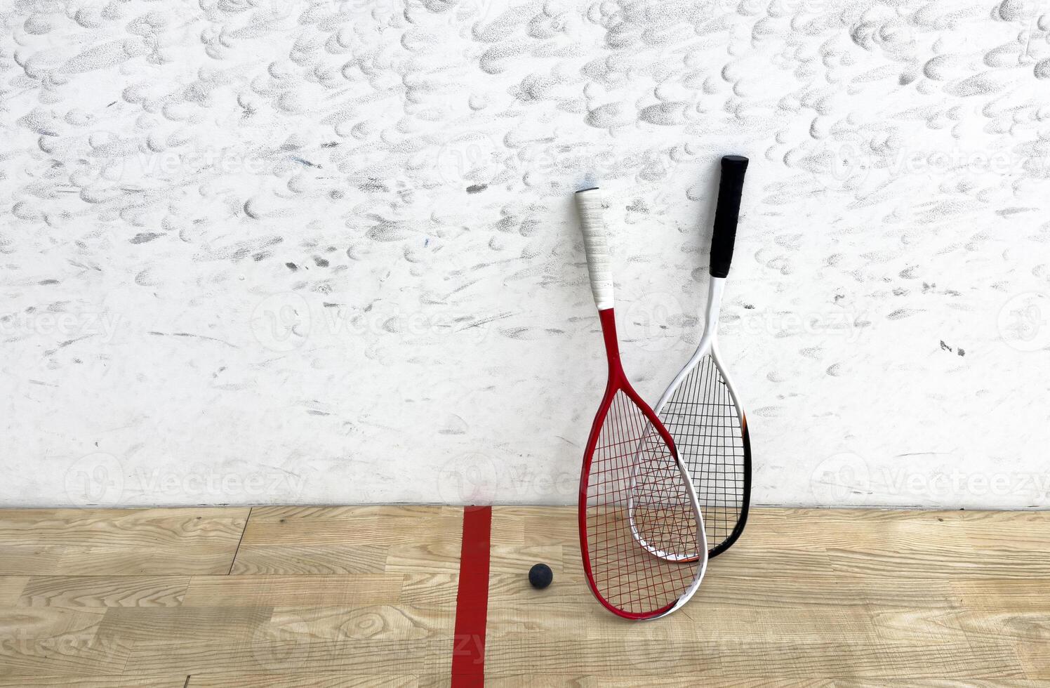 Sports, above and racket on squash court for competition, challenge and training center. Exercise, interior and empty room with top view of wooden floor of gymnasium for games, fitness club and gear photo