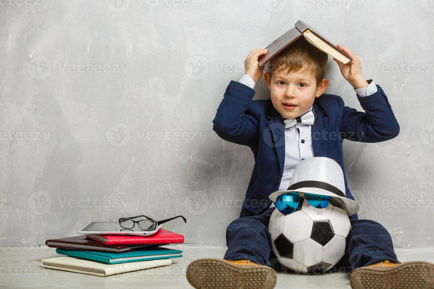 stylish little boy. Little child in glasses. Success, bright idea photo