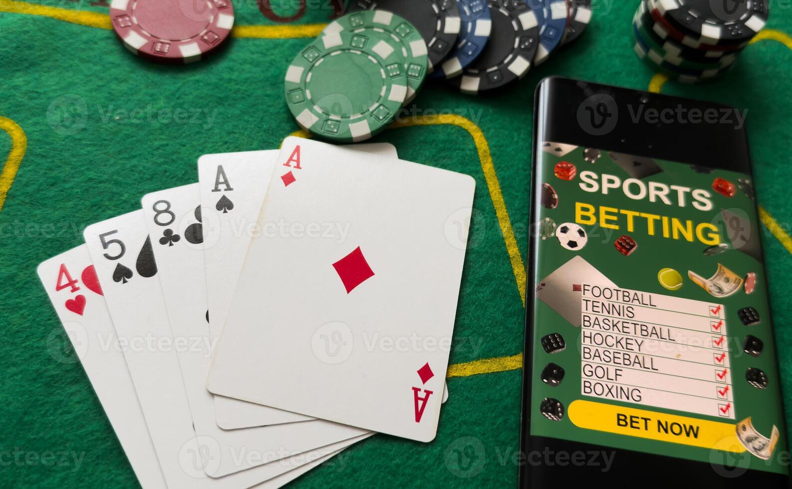 Smartphone, money, playing cards and chips. Online casino photo