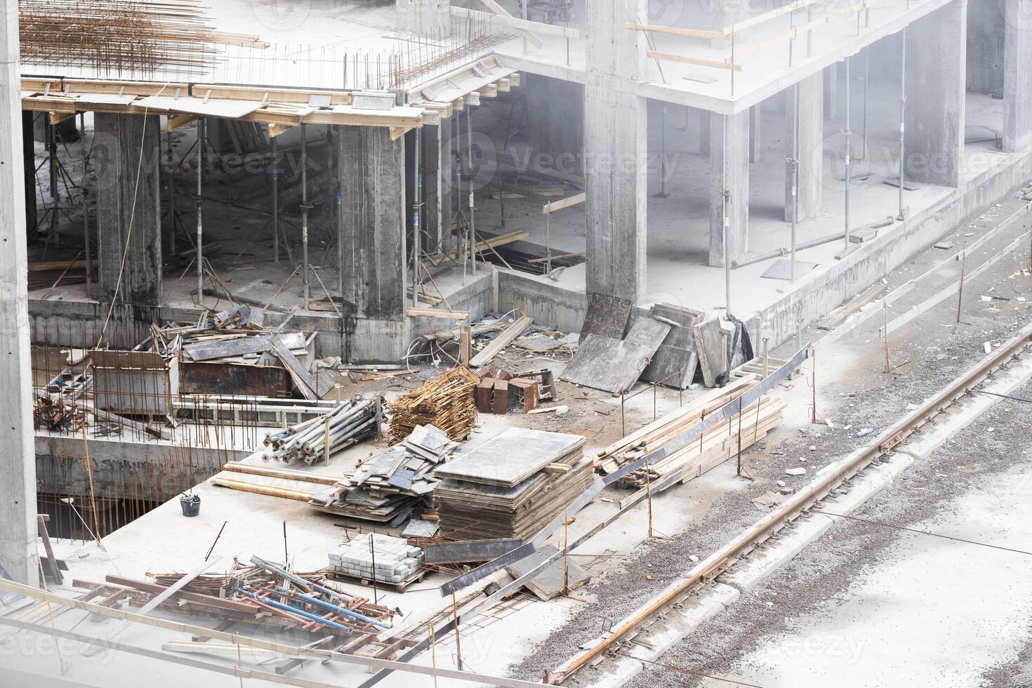 Construction site background. Hoisting cranes and new multi-storey buildings. Industrial background. photo