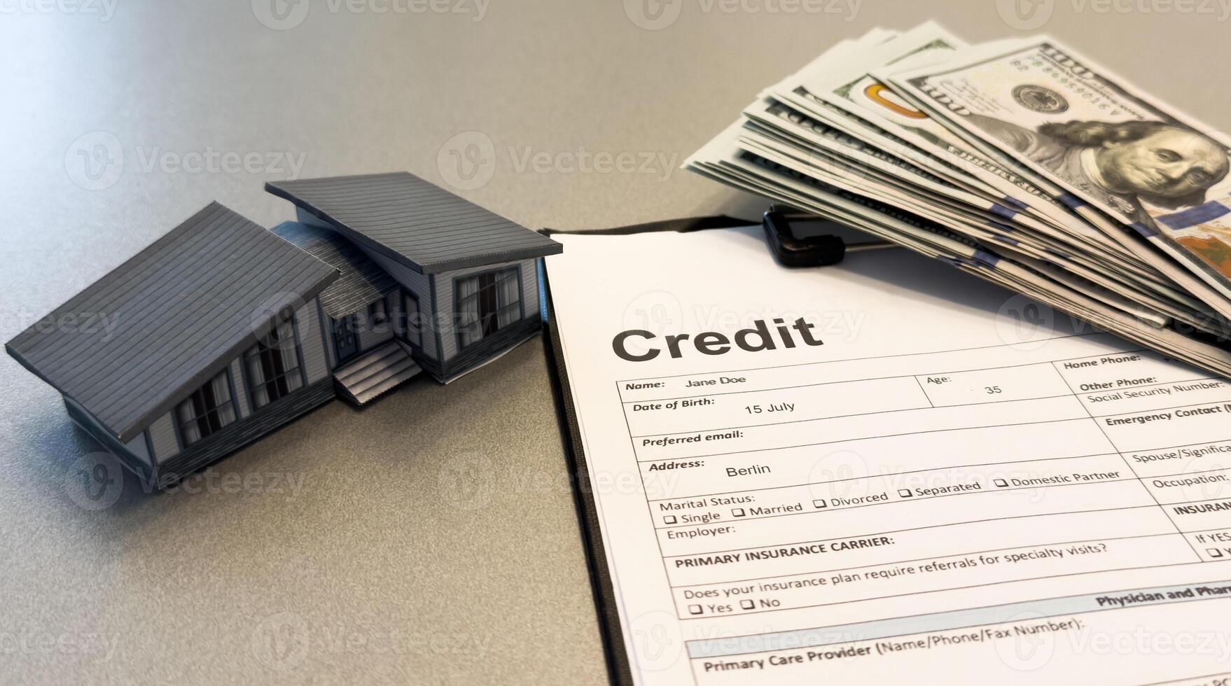 Business loan concept. Maniature house and pile of hundred dollar bills. photo