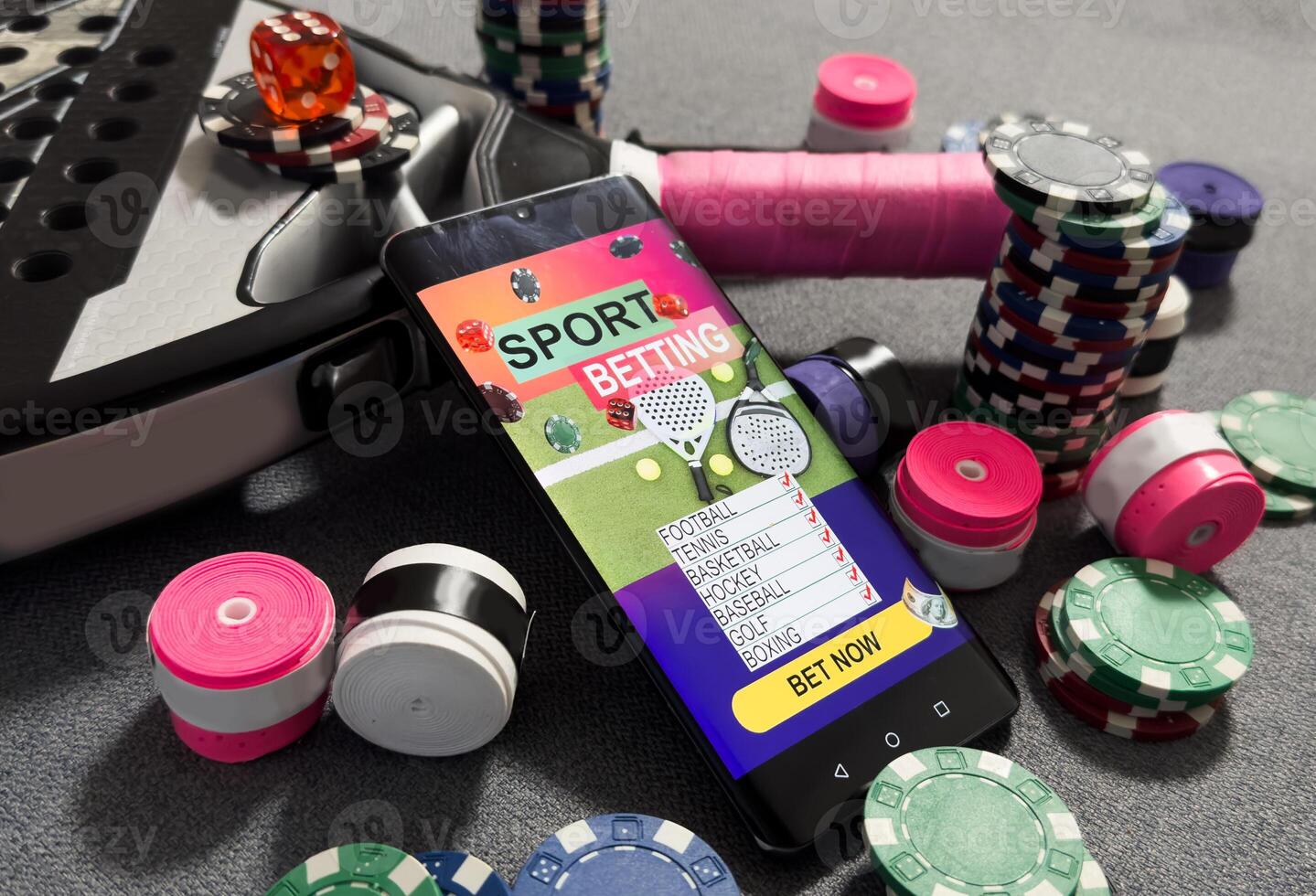 padel tennis and sports betting on a smartphone. Concept of sports bet photo