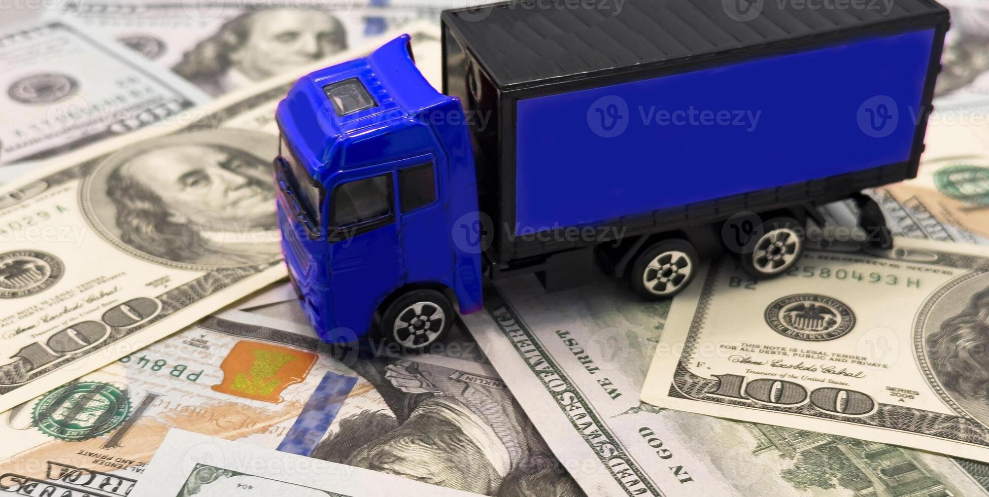 a toy truck is on the banknotes photo
