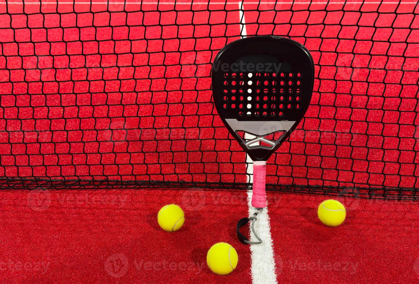 Padel tennis racket. Background with copy space. Sport court and balls. photo