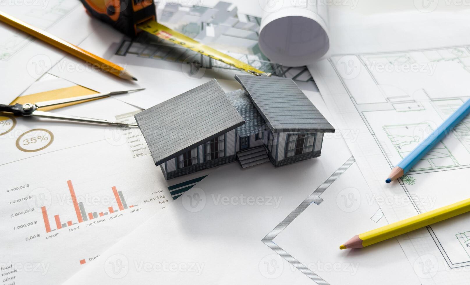 Housing blueprint working desk of architect engineer, only object shot. photo