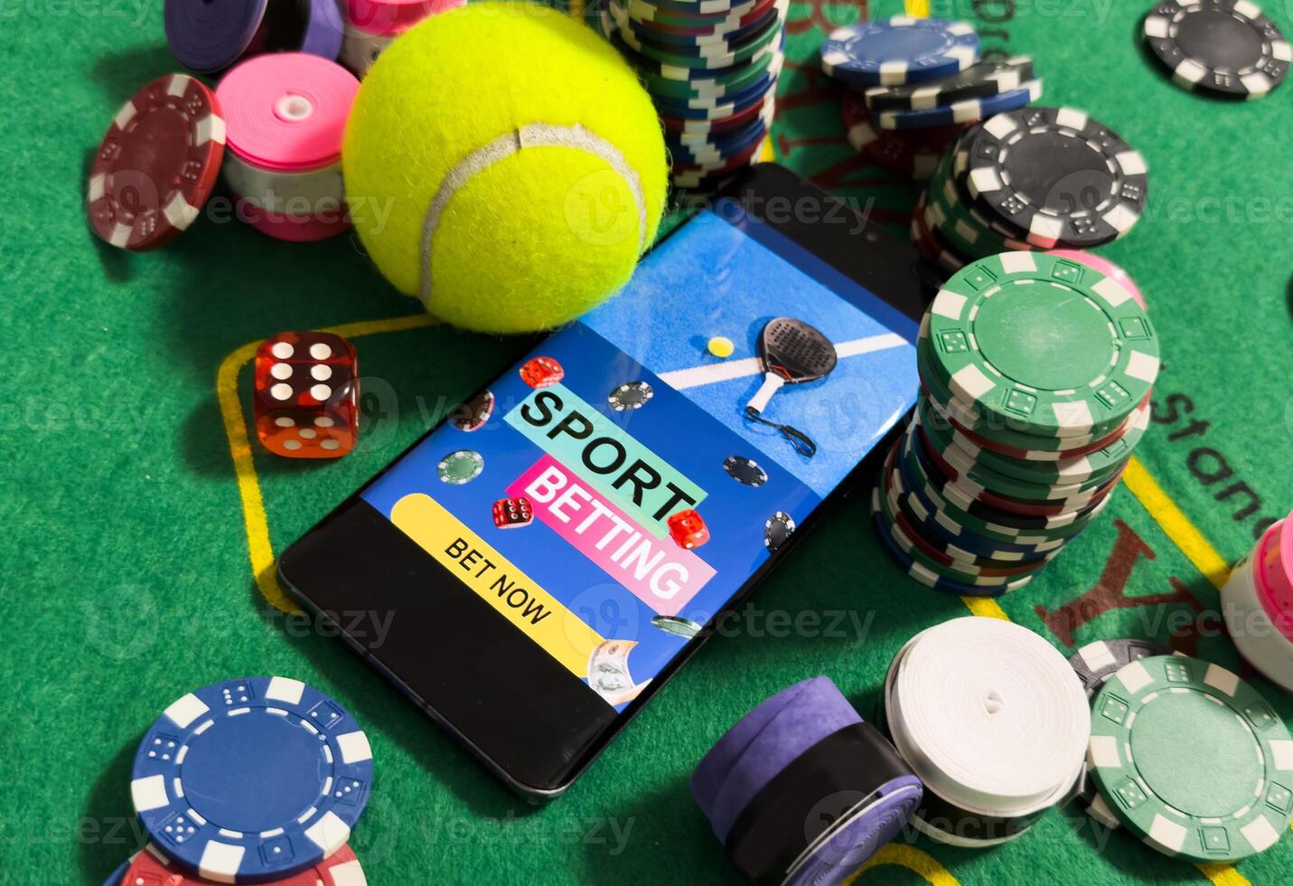 padel racket and smartphone with sports betting photo