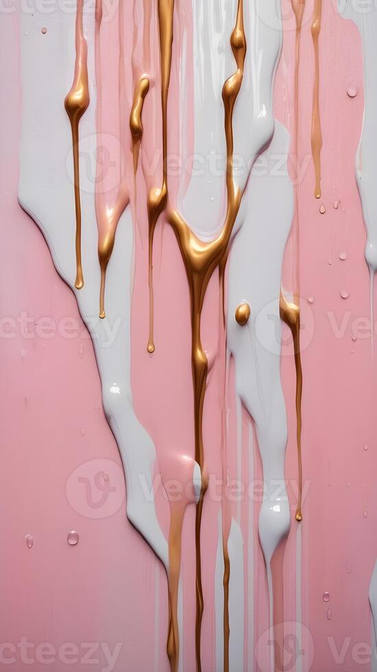 A close image of dripping, glossy paint creating fluid, organic patterns. photo