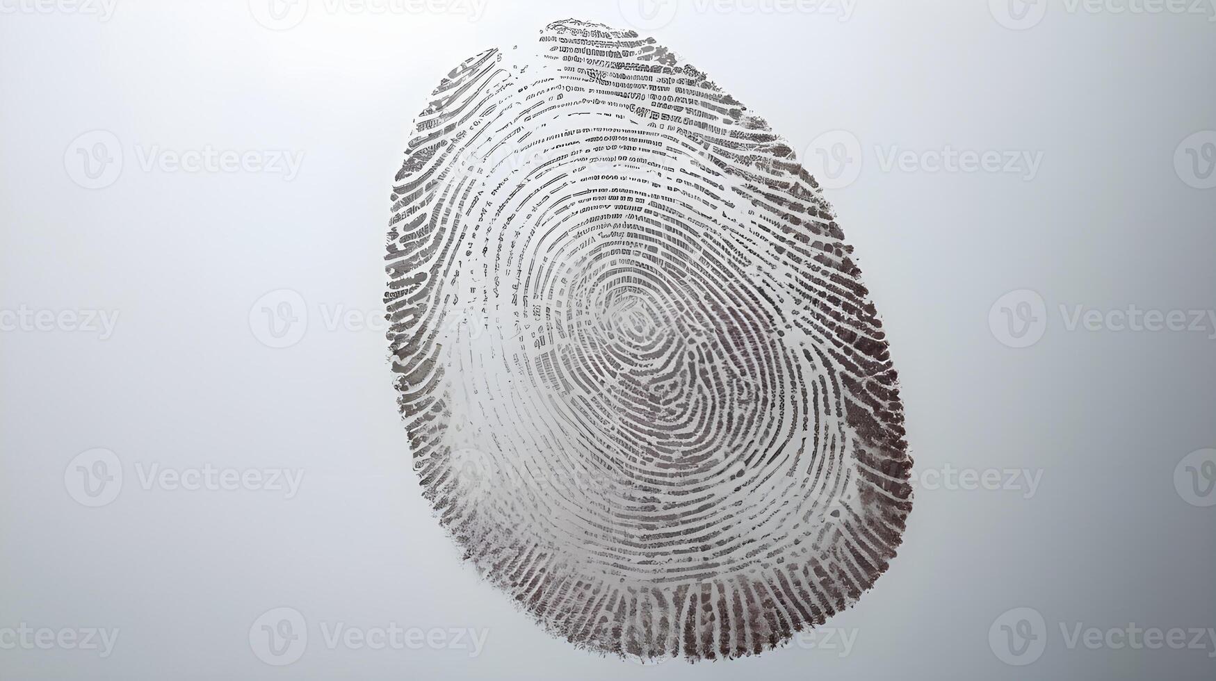 A zoomed-in view of a human fingerprint impression on polished glass. photo