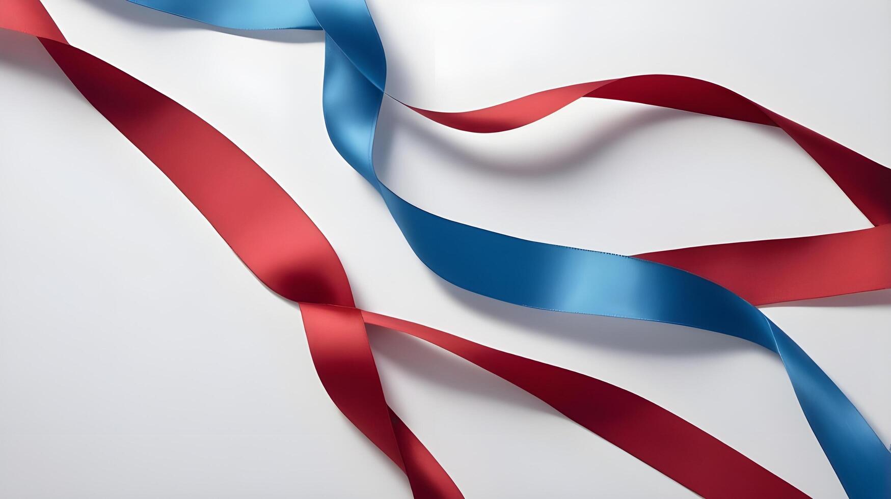 A close-up shot of intertwined red and blue silky ribbons, leaving a polished empty space for Presidents Day messaging. photo
