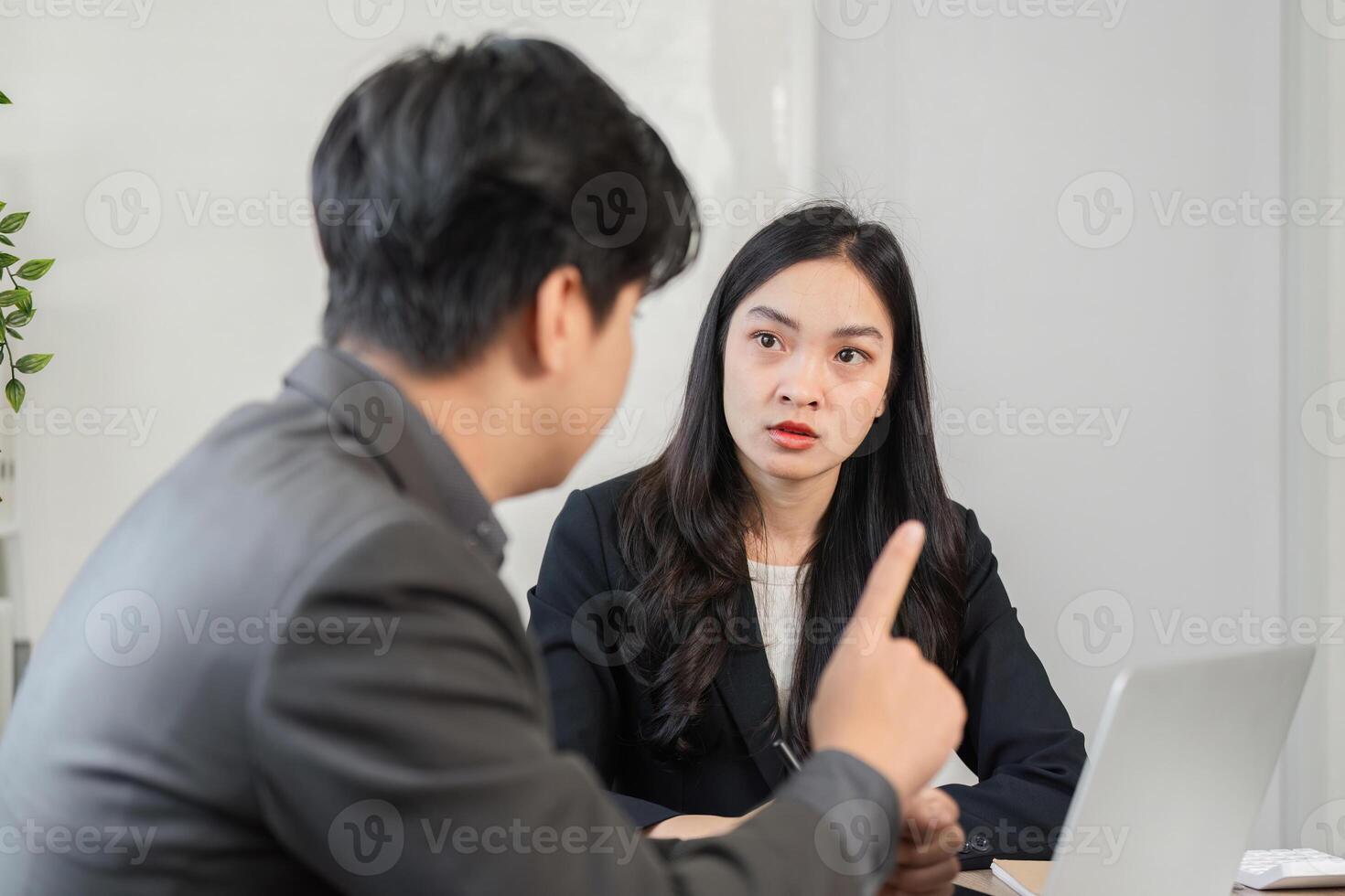 Colleagues analyzing financial data and reports in a collaborative meeting. photo