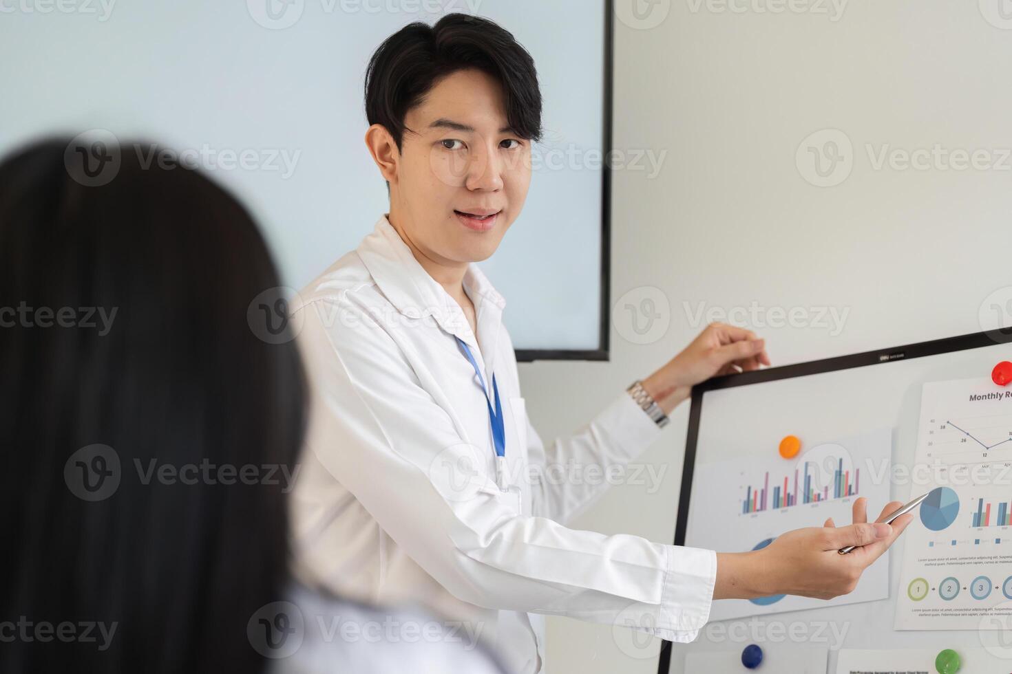 Professional worker presenting financial data in a meeting, showcasing tax strategies and analysis. photo