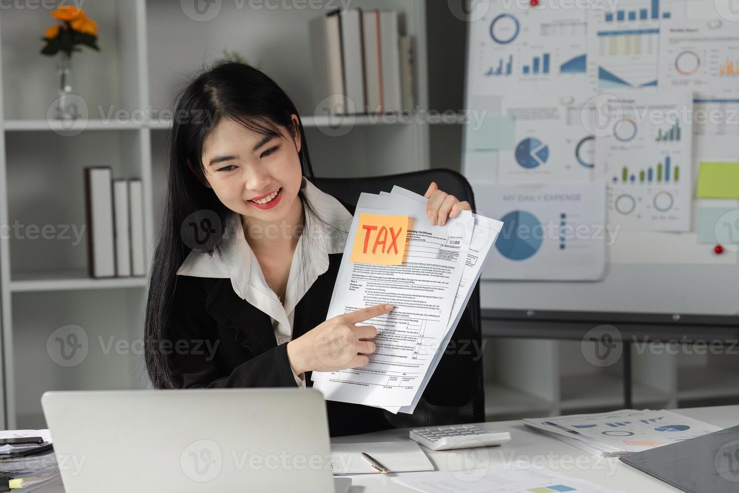Accountant presenting tax documents, highlighting key financial information. photo