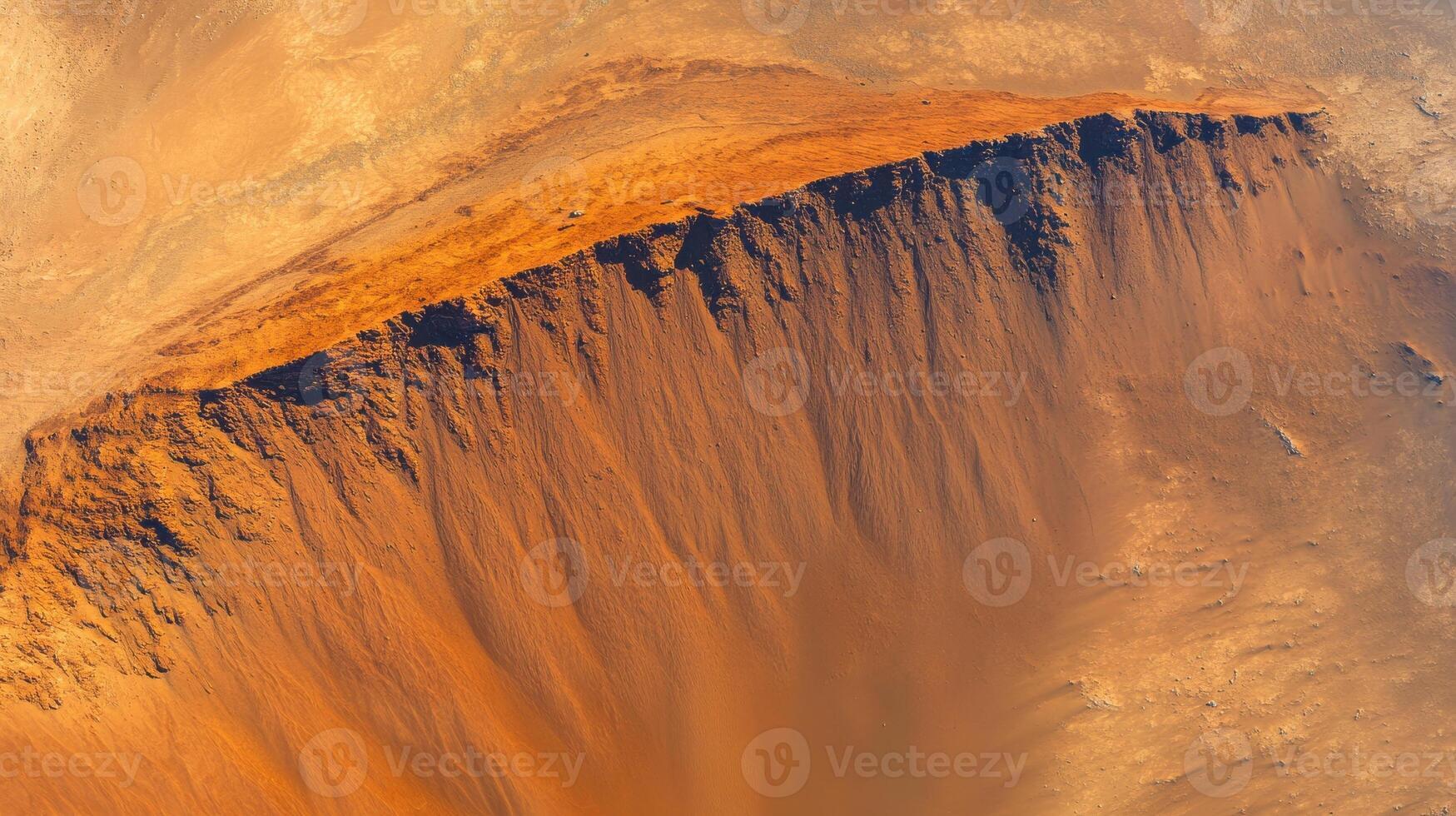 Aerial view of mars-like desert canyon with layered erosion patterns photo