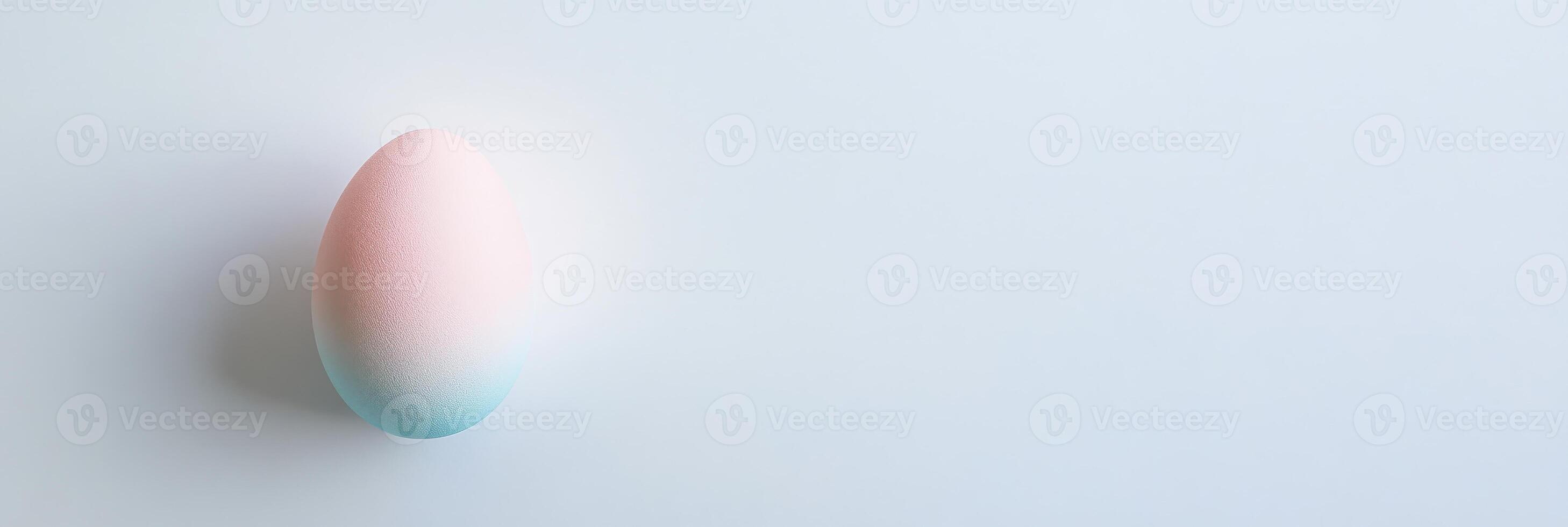 Pastel gradient egg on light background symbolizing simplicity and minimalism photo